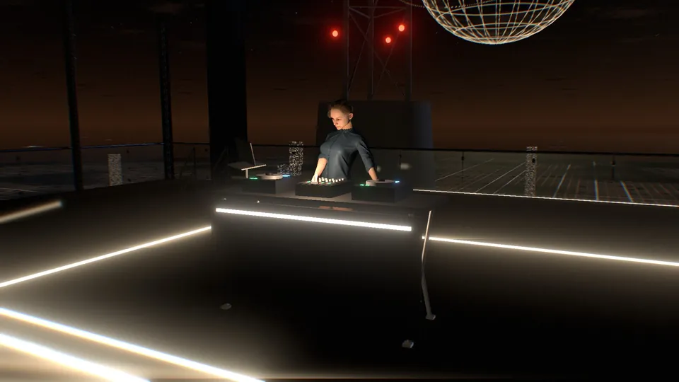 A stand-in DJ playing at a booth on the stage.